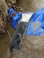 tarp-dam.webp