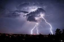 lightning-strikes-from-a-cloud-during-a-thunderstorm-above-the-city-of-goerlitz-eastern-germany-.jpg
