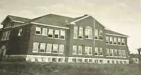 75cd_1POSTCARD OF OLD GALENA KANSAS HIGH SCHOOL.webp