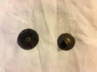 backsof colonial buttons.webp