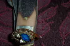 gold ring blue stone.webp