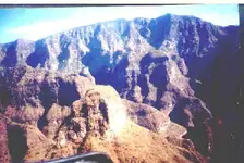 .jpgLooking up Tayopa canyon up to the mesa above.webp
