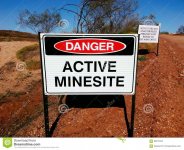 active-mine-mining-site-danger-sign-two-signs-minesite-all-visitors-unauthorised-personel-must-r.jpg