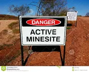 active-mine-mining-site-danger-sign-two-signs-minesite-all-visitors-unauthorised-personel-mus...webp