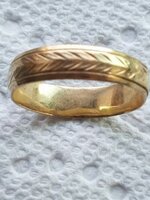 Gold ring w fethering 040917.jpg