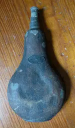ANTIQUE-JOHN-HALL-TIN-GUN-POWDER-FLASK.webp ANTIQUE-JOHN-HALL-TIN-GUN-POWDER-FLASK.webp