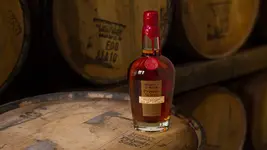Makers-Mark-Private-Select-1920x1080-Bottle-On-Barrel.webp