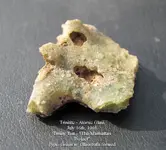 Trinitite Green with balls.webp