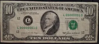 Ten-dollar-bill-serial-number-0000001.webp
