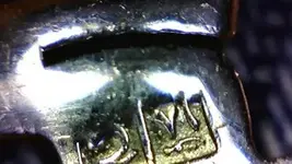 egyptian-hallmarks-on-a-gold-pendant-21401061.webp