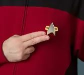 1a88_star_trek_voyager_communicator_badge_inuse.webp