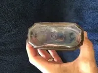 square glass bottle bottom.webp