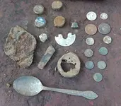 Metal detecting Travis yard.webp