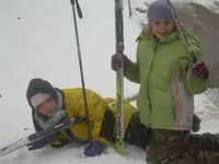girls tired from skiing.webp