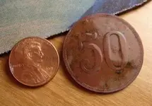 compar 50 coin.webp