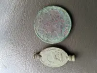 pendant and half cent.webp