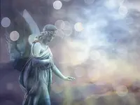 angel-clouds-statue-sparkle-light_credit-Shutterstock.webp