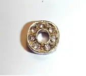 Silver and possible diamond jewelry piece.webp Silver and possible diamond jewelry piece.webp