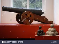 cannon-and-ammunition-from-the-wreck-of-the-girona-the-spanish-armada-CE5MAA.webp