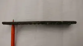 BronzeRectangleMDBeachFindLongEdgeW_PencilAt Hole.webp