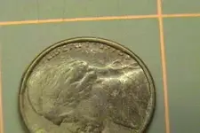 080106 Nickel rim date a.webp