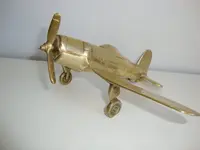 brass plane.webp