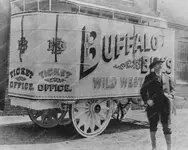 BuffaloBillinfrontofwagon1890s8x10.webp