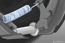 5-How to Adjust Drum Brakes-Star wheel shown through access hole.webp 5-How to Adjust Drum Brakes-Star wheel shown through access hole.webp
