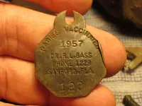 15 112517 LB House Dog Tag.webp