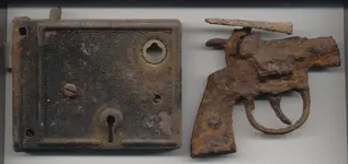 toygunandlockplate.webp