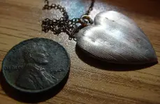 wheat and locket.webp wheat and locket.webp