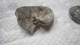 6 silver coins in baseball field 025.webp