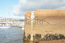 81338298-water-depth-marker-with-depth-in-feet-on-sea-wall-in-teignmouth-devon-england.jpg