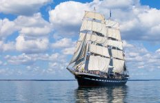 clipper-ship-in-front-of-cloudy-sky.jpg