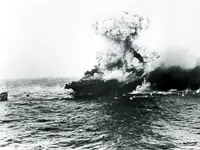 Large_explosion_aboard_USS_Lexington_(CV-2),_8_may_1942.webp