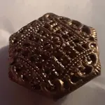 brass-hexagonal-intricate-front.webp