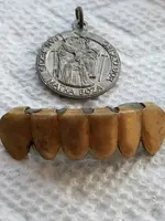 Dentures and Medal.webp