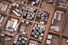 antique-letterpress-printing-blocks-wooden-box-45820091.webp