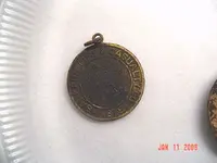 Insurancemedalionreverse.webp