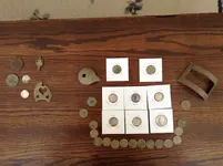 groupofmetaldetectingfinds.webp