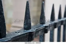 detail-of-an-old-wrought-iron-fence-in-bostons-historic-district-d55xw1.webp