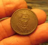 18 TV 07 2018 Harrison Dollar Coin Obv.webp