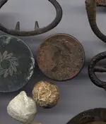 cellar hole coin close up.webp