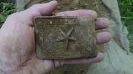 Plate in Hand Dirty.webp
