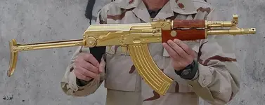 SADAM'S GOLDEN GUN 1'.webp SADAM'S GOLDEN GUN 1'.webp