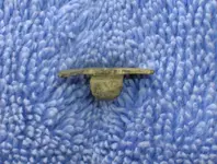 Broken Buttob - side.webp