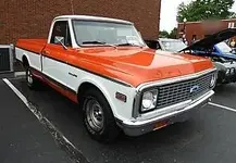 orange and white truck.webp orange and white truck.webp