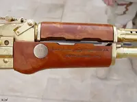 SADDAMS GOLDEN GUNS 3.webp SADDAMS GOLDEN GUNS 3.webp