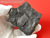 stone-meteorite-fusion-crust-400.webp