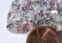 reddish cyrstals scale1.webp